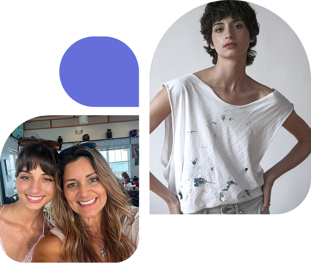 Two smiling women taking a selfie in a kitchen.